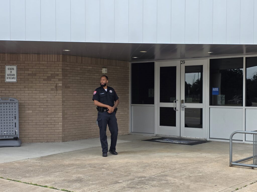 Security guard insurance in Houston covers officers like this Op6 guard posted at a building entrance